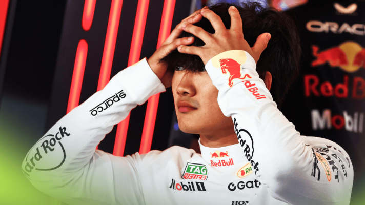 Yuki Tsunoda holds his hands to his head in despair