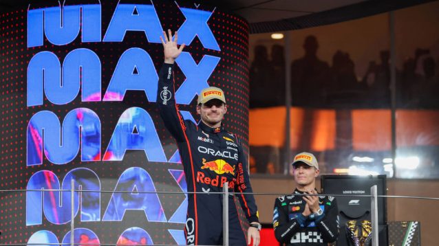 Max Verstappen on the podium with Lando Norris