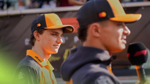 Oscar Piastri watches his teammate Lando Norris speak to media before the Abu Dhabi Formula One Grand Prix