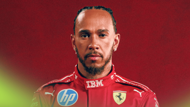 A portrait of Lewis Hamilton wearing Ferrari overalls against a red background