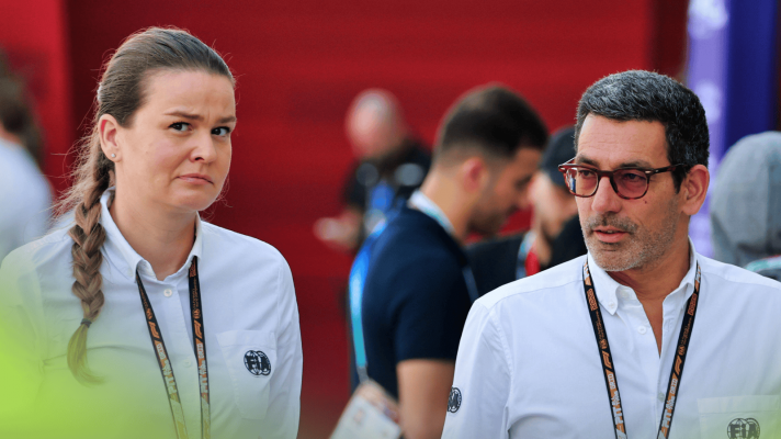 Claire Dubbelman and Rui Marques walk through the paddock in Qatar