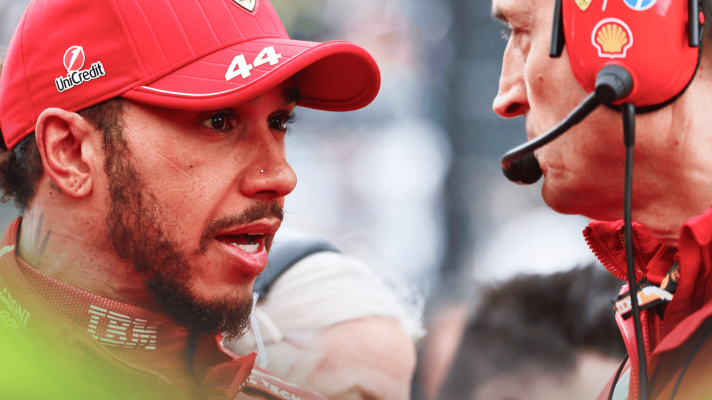 Lewis Hamilton in conversation with Riccardo Adami on the grid at Suzuka