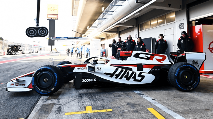 Esteban Ocon's Haas leaves the garage during the Barcelona shakedown