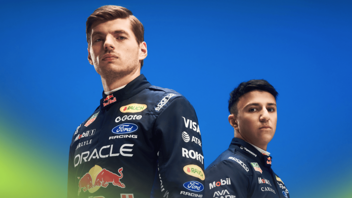 Max Verstappen and Isack Hadjar pose together in Red Bull's 2026 race suits
