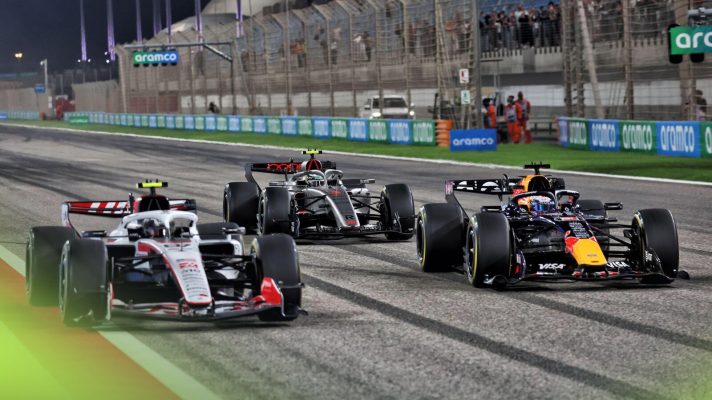 Three F1 2026 cars race off the line in a pratice start during pre-season testing in Bahrain.