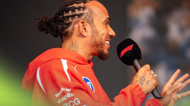 Ferrari driver Lewis Hamilton speaks to the crowd at the 2026 Australian Grand Prix