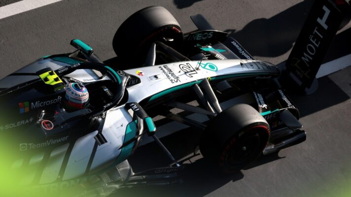 Kimi Antonelli parks in front of the #1 board after qualifying on pole for the Chinese Grand Prix.