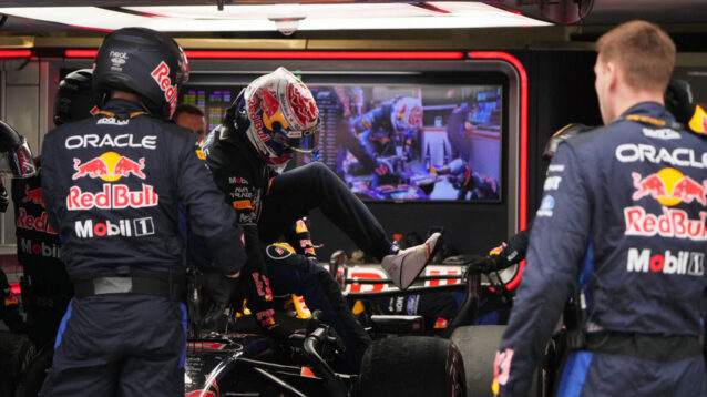 Max Verstappen climbs out of his RB22