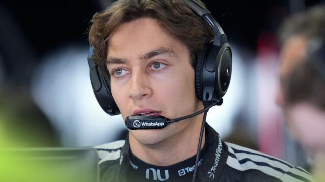 Mercedes driver George Russell speaks into a headset at the 2026 Japanese Grand Prix