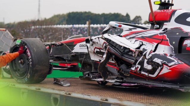 The wreckage of Oliver Bearman's Haas being recovered at the 2026 Japanese Grand Prix