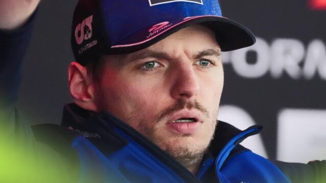 A close-up shot of Max Verstappen with a surprise facial expression