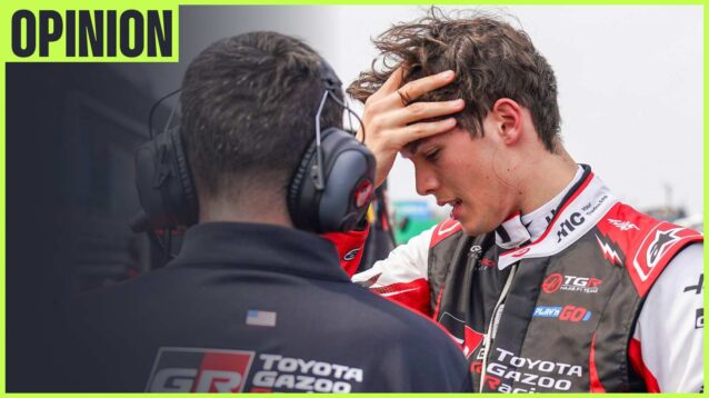 Haas driver Oliver Bearman talks to his engineer on the grid at Suzuka.