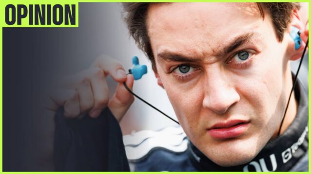 A close-up shot of George Russell inserting his earplugs with an 'opinion' tab in the top-left corner