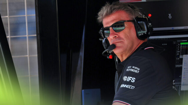 Cadillac team boss Graeme Lowdon on the pit wall.