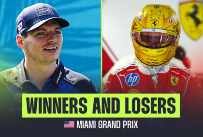 Max Verstappen smiles for the camera opposite Lewis Hamilton wearing his yellow helmet.