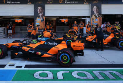 Lando Norris and Oscar Piastri in the pit lane