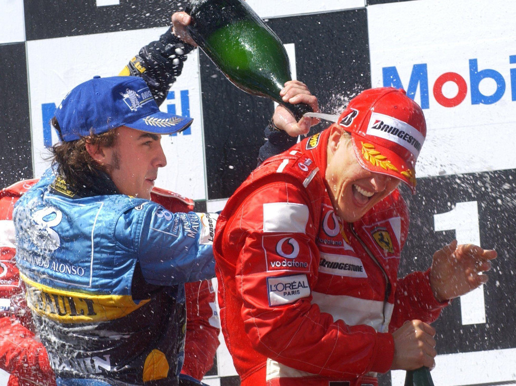 Michael-schumacher-and-fernando-Alonso-French-GP-PA