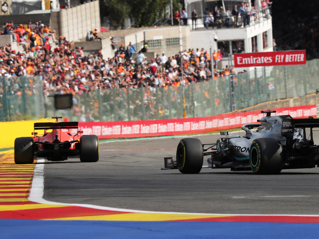 Lewis Hamilton chases Ferrari