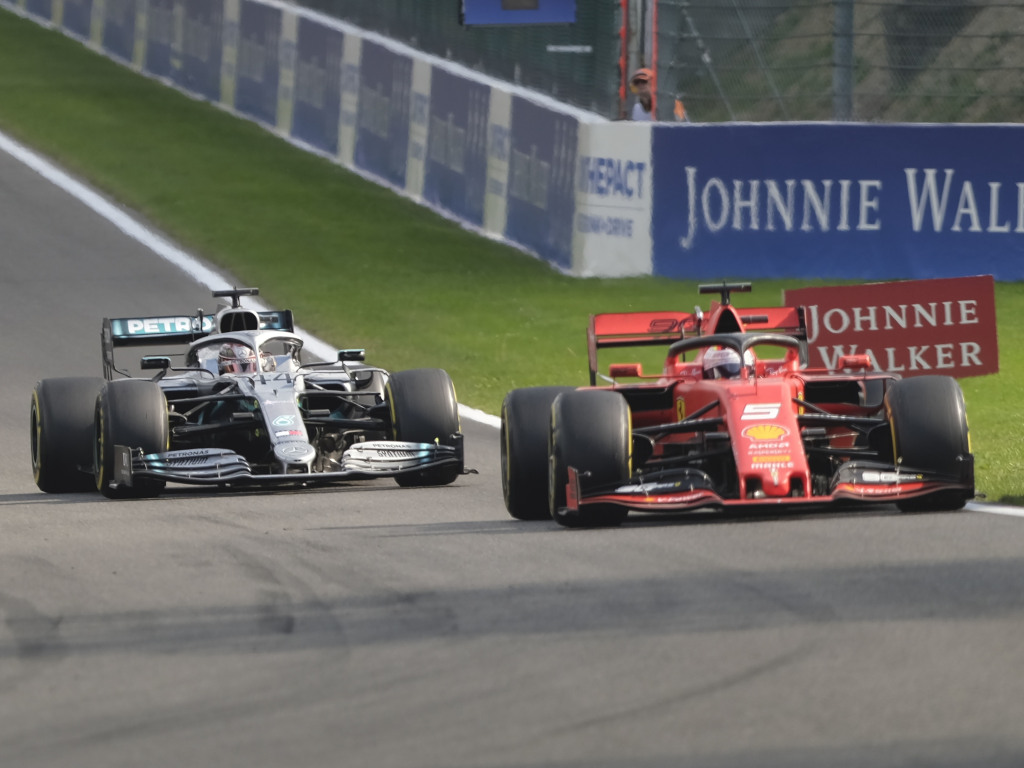 Sebastian Vettel holding off Lewis Hamilton
