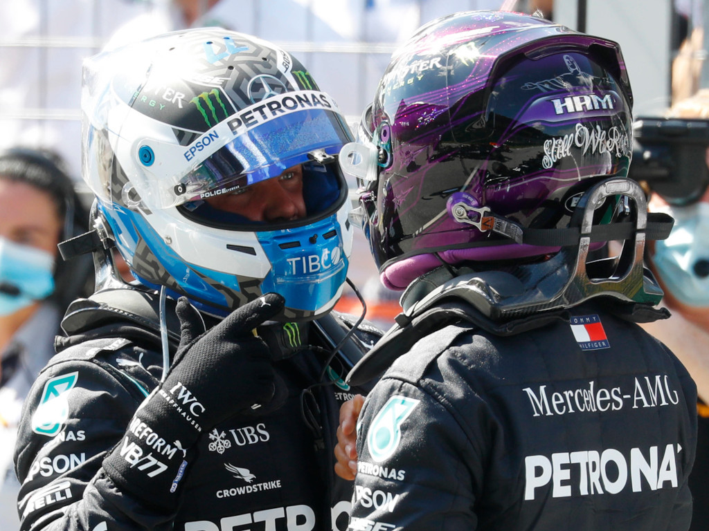 Valtteri Bottas and Lewis Hamilton celebrate PA