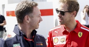 Sebastian Vettel (Ferrari) and Christian Horner (Red Bull)