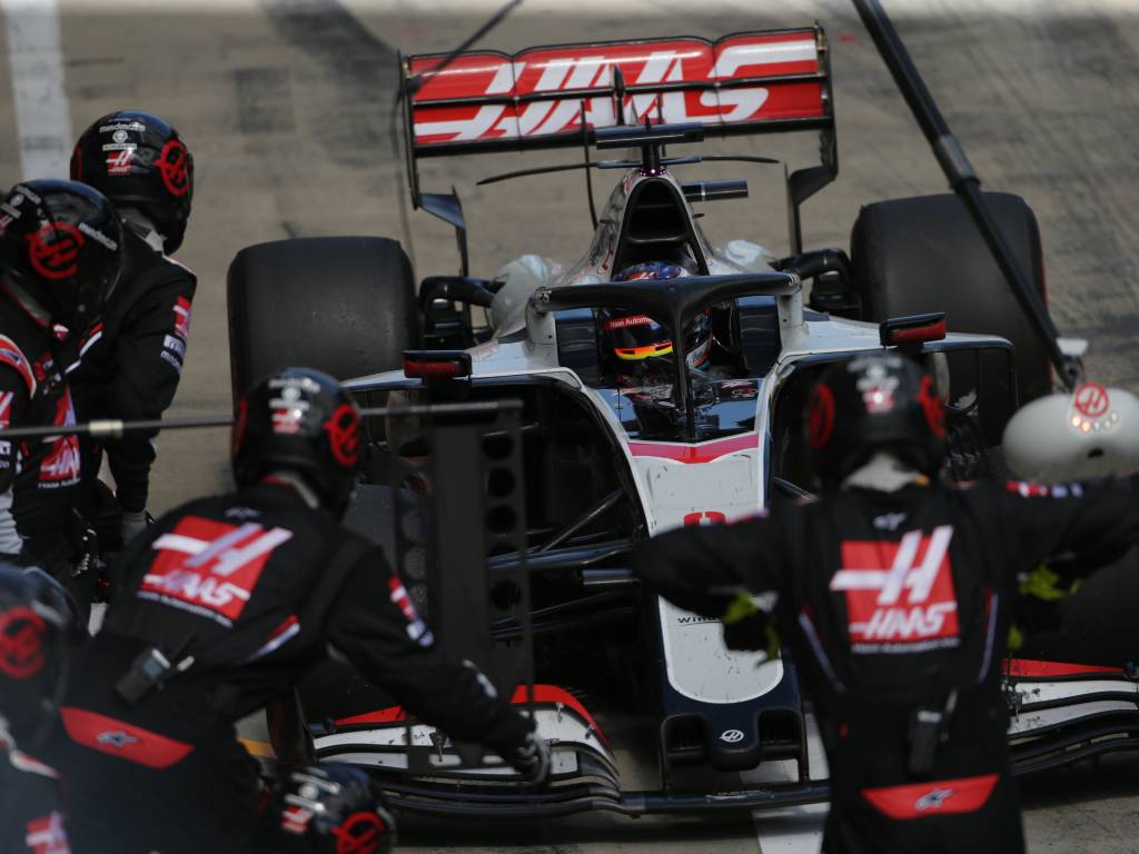 Romain Grosjean (Haas) makes a pit stop
