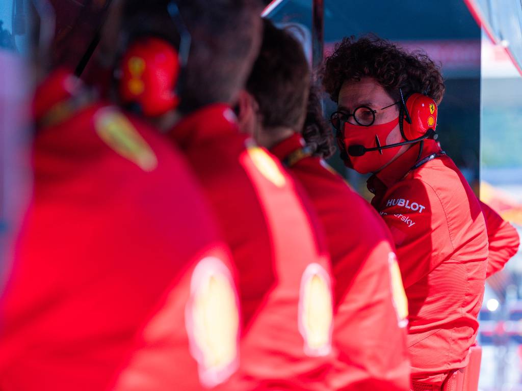 Ferrari team principal Mattia Binotto on the pit wall