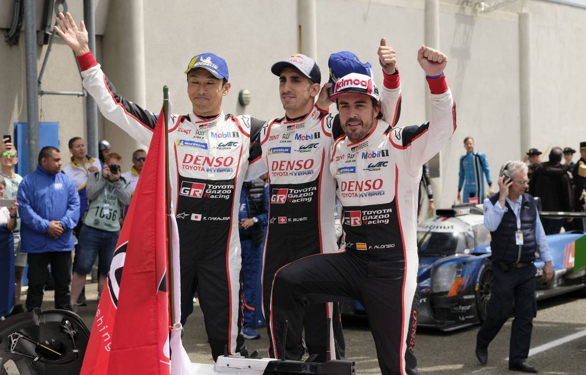 Fernando Alonso (right), Sebastien Buemi (centre) and Kazuki Nakajima celebrate their 2019 Le Mans 24-Hour Race victory