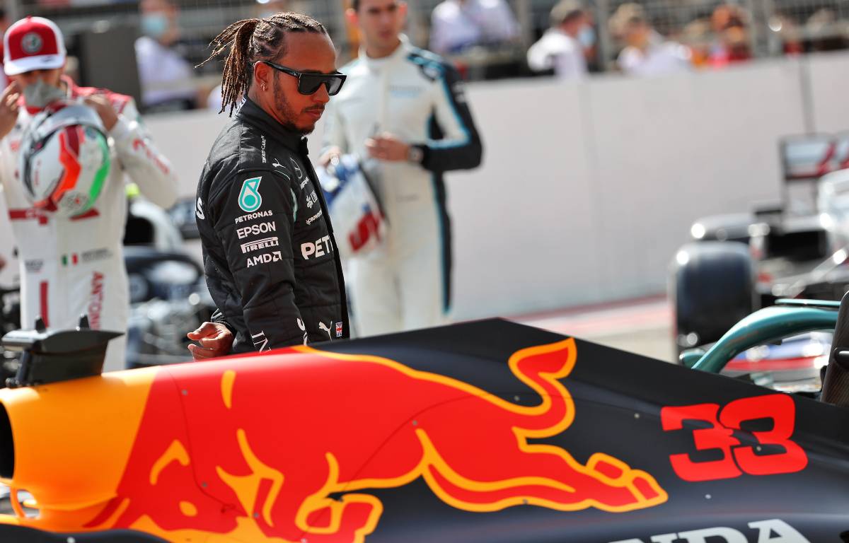 Lewis Hamilton looks at Max Verstappen's Red Bull in Bahrain 2021