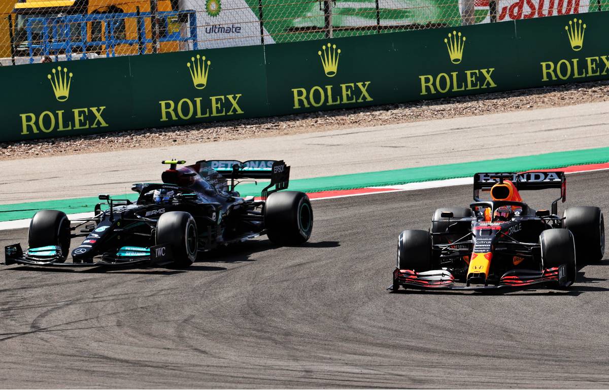 Valtteri Bottas, Mercedes, is overtaken by Max Verstappen, Red Bull, in the 2021 Portuguese Grand Prix