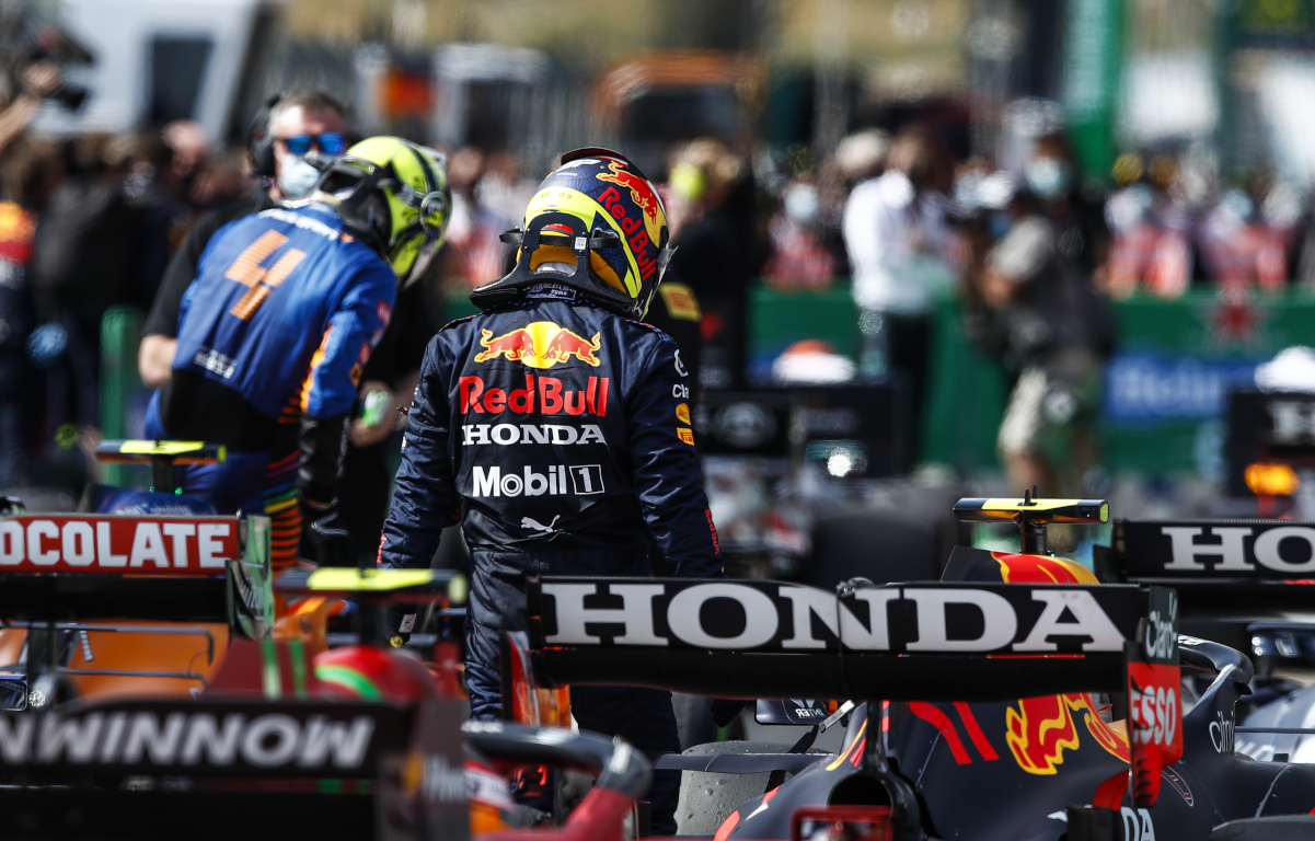 Sergio Perez with Lando Norris in the background