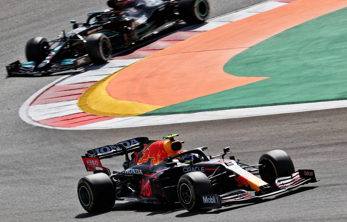 Sergio Perez, Red Bull, ahead of a Mercedes