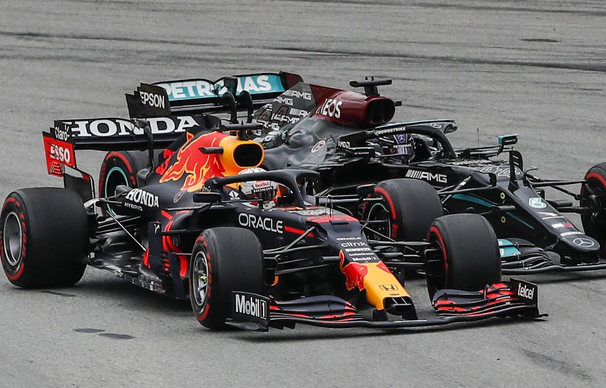 Max Verstappen races Lewis Hamilton