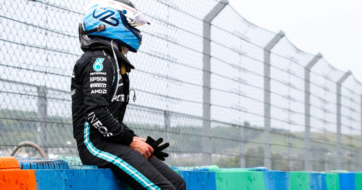 Valtteri Bottas sitting on a wall