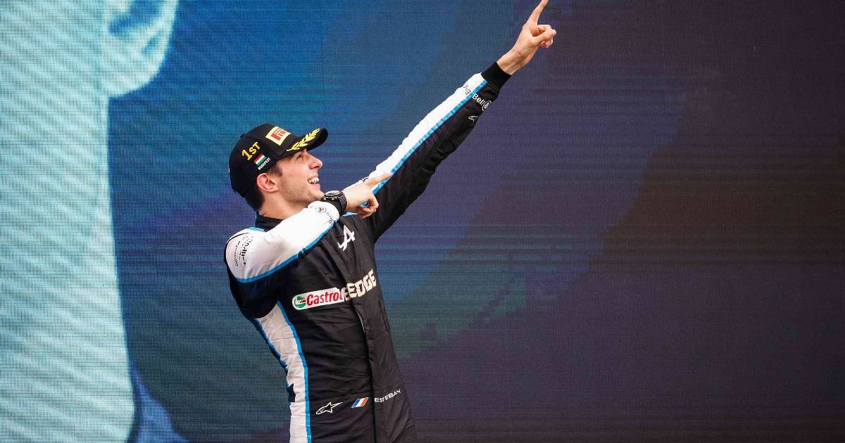 Esteban Ocon celebrates victory on the podium. Hungary, August 2021.