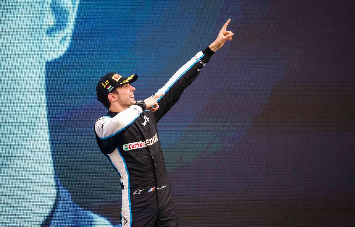 Esteban Ocon celebrates victory on the podium. Hungary, August 2021.