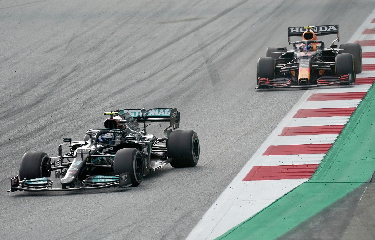 Valtteri Bottas [Mercedes] leads Sergio Perez [Red Bull]. Austria June 2021