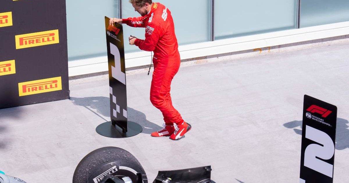 Sebastian Vettel swaps the marker boards after the Canadian Grand Prix. Montreal June 2019.
