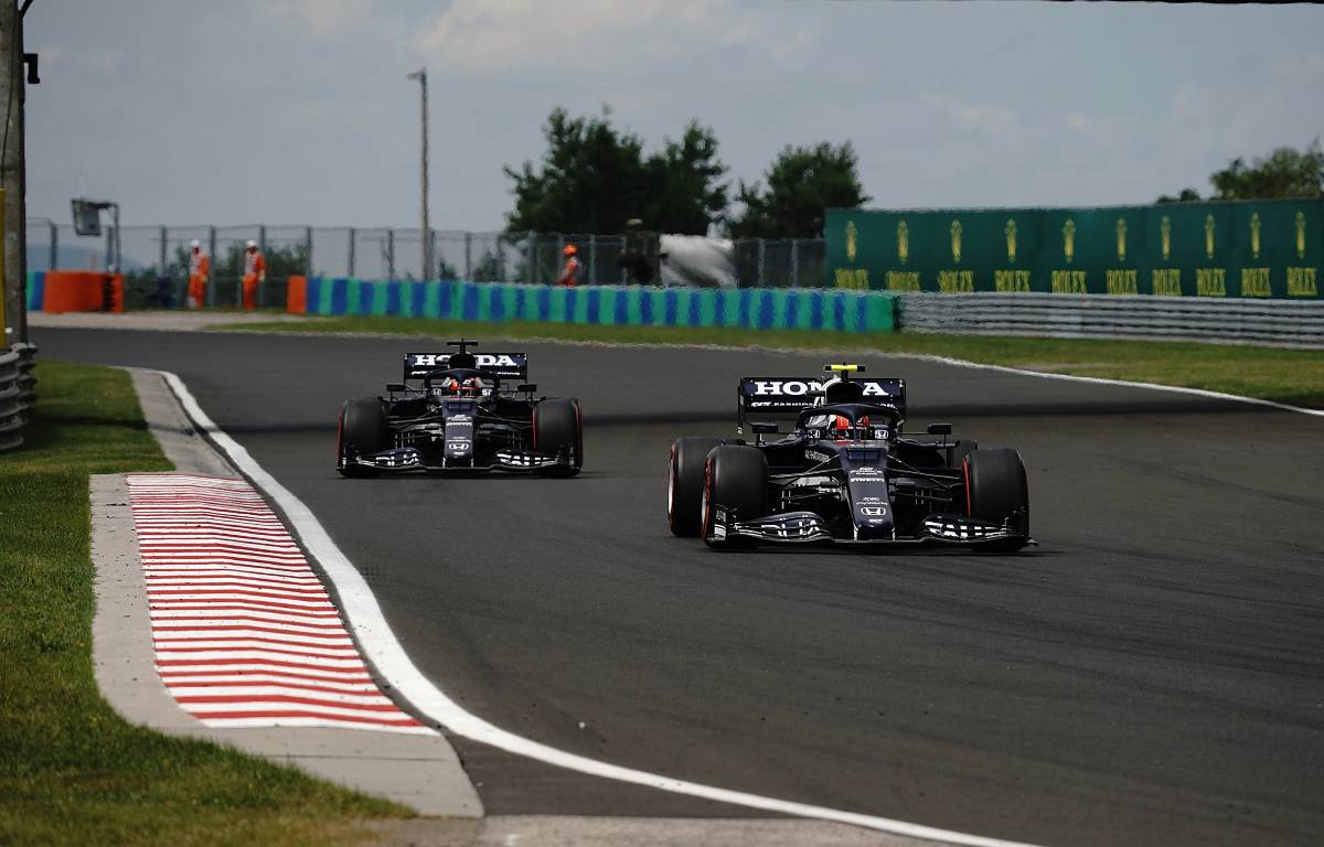 AlphaTauri driver Pierre Gasly followed by Yuki Tsunoda on Hungarian Grand Prix qualifying day. Hungaroring July 2021.
