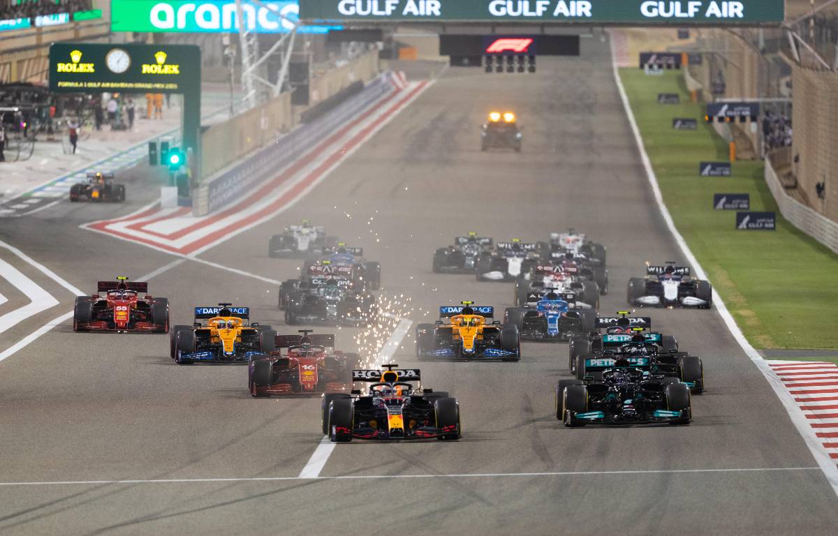 Max Verstappen leads going into turn one of the Bahrain Grand Prix. Sakhir March 2021.
