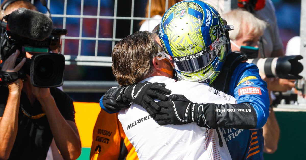 Lando Norris hugs Zak Brown. Austria July 2020