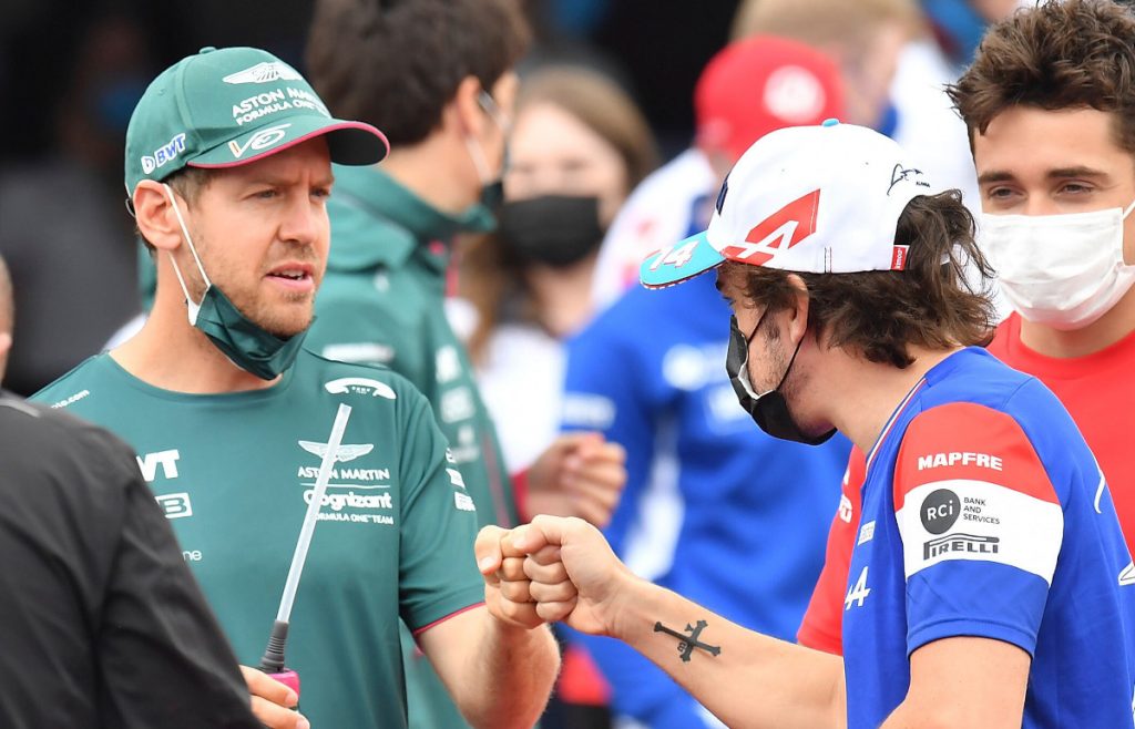 Sebastian Vettel greets Fernando Alonso. France June 2021