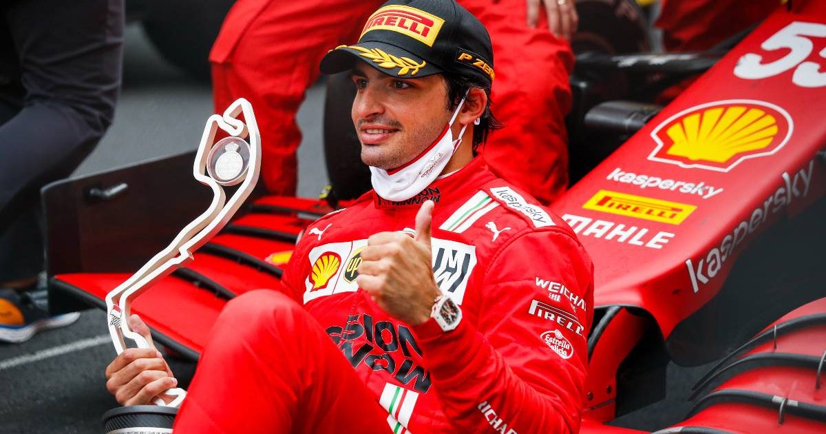 Ferrari's Carlos Sainz poses with his Monaco P2 trophy. May, 2021.