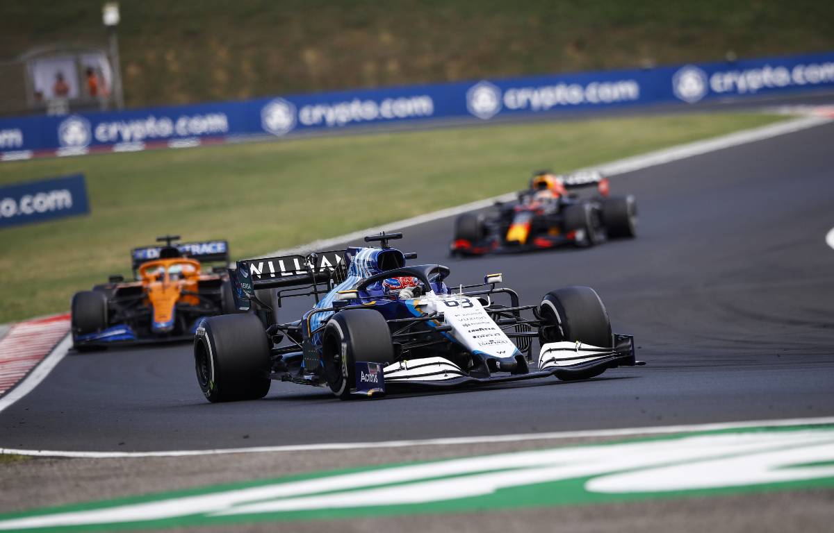 George Russell ahead of a McLaren and a Red Bull during the Hungarian GP. Hungaroring August 2021.