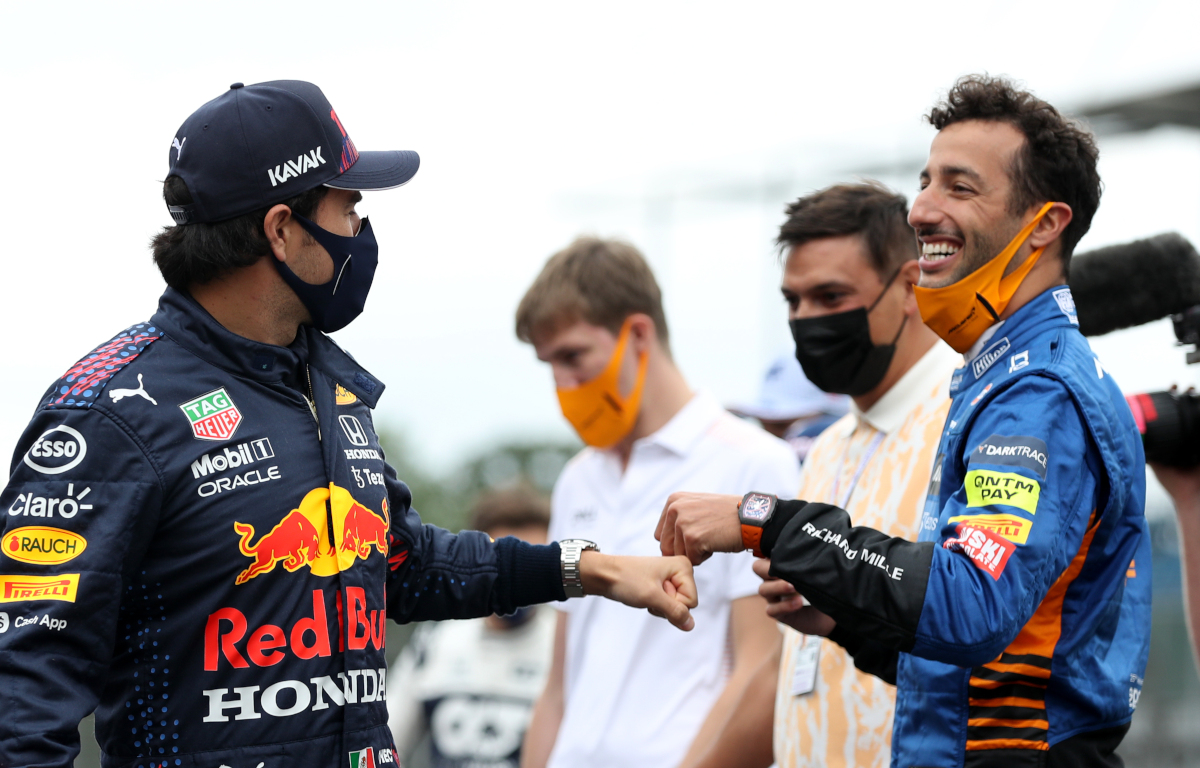 Sergio Perez greets Daniel Ricciardo. Britain July 2021