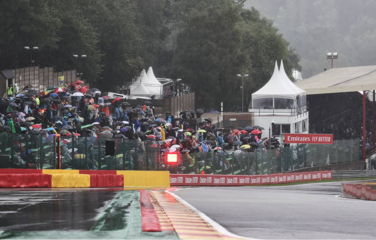 Fans holding umbrellas at the wet Belgian Grand Prix. August 2021.
