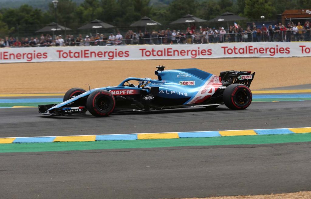 Fernando Alonso runs a Formula 1 car around Le Mans