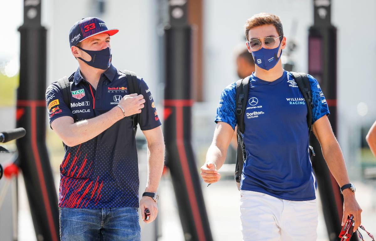 Max Verstappen and George Russell enter the British GP paddock. Silverstone July 2021.
