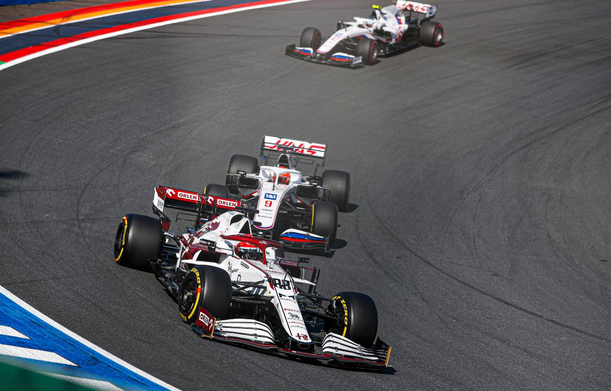 Robert Kubica leads Haas' Nikita Mazepin at the Dutch GP. September 2021.