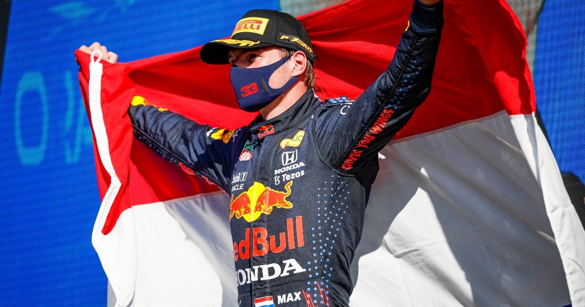 Max Verstappen holding a Dutch flag in celebration. Netherlands September 2021